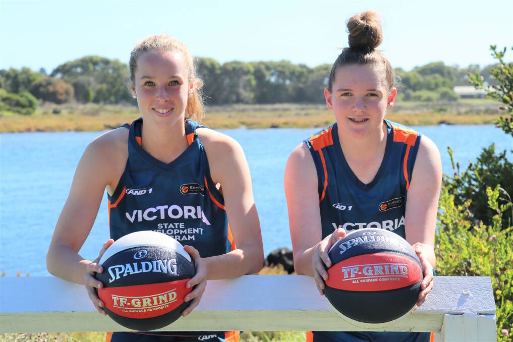 TEAMMATES: Poppy Myers and Eve Covey, both 14, in their home town of Port Fairy. Picture: Justine McCullagh-Beasy 