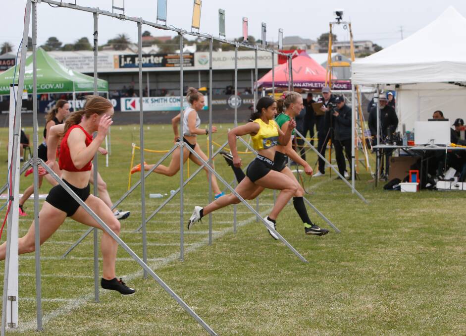 CLOSE CALL: Layla Watson, in the green, edges home in the Warrnambool Gift's 120 women's final. Picture: Emma Stapleton 