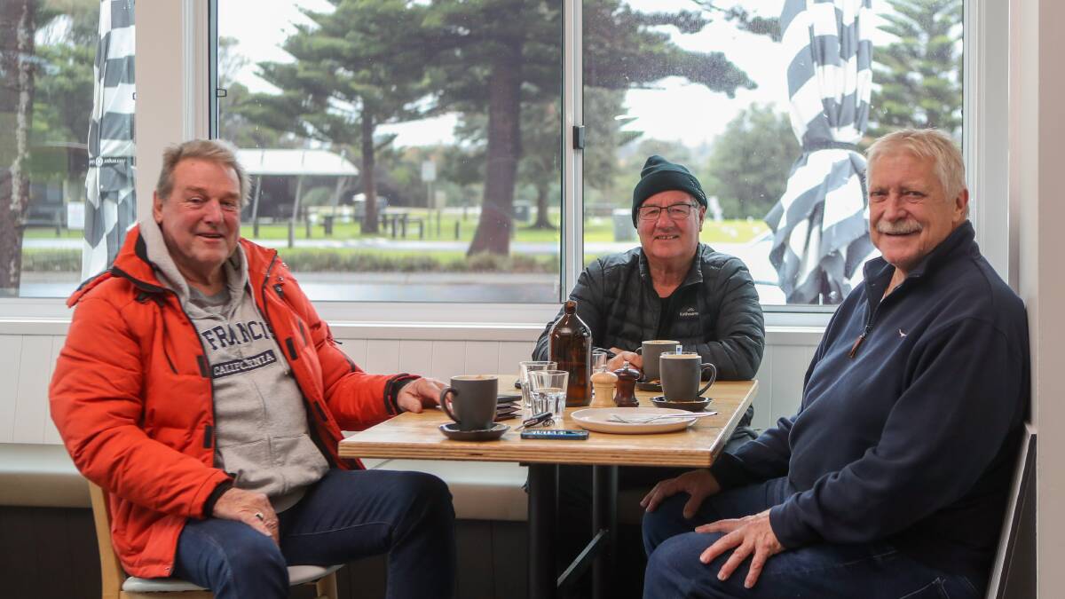 RELAX: Errol Stewart, Trev Bonney and Bob McMillan were excited to catch up inside the Main Beach Kiosk. Picture: Morgan Hancock