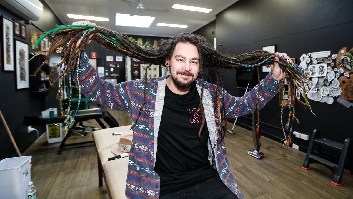 BIG LOSS: Warrnambool tattoo artists Mark Weston is shaving off the dreadlocks he's been growing for 10 years to raise money and awareness for Beyond Blue after losing two people close to him to suicide. Picture: Anthony Brady 