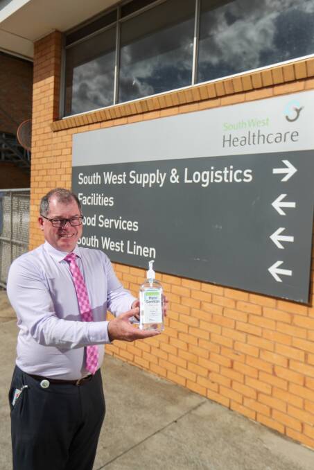 IDEA: South West Healthcare regional supply chain manager Terry Hoy shows off the sanitiser which fixes the hospital's shortage problem.