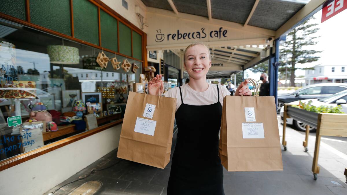 Kaitlyn Coulton from Rebecca's Cafe with the show bags. Picture: Anthony Brady 