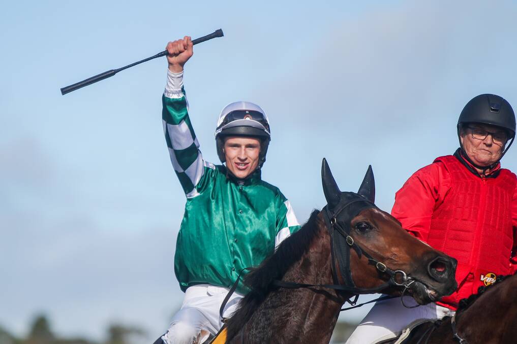 Will Gordon celebrates after riding The Statesman to victory in the Galleywood Hurdle. Picture: Morgan Hancock