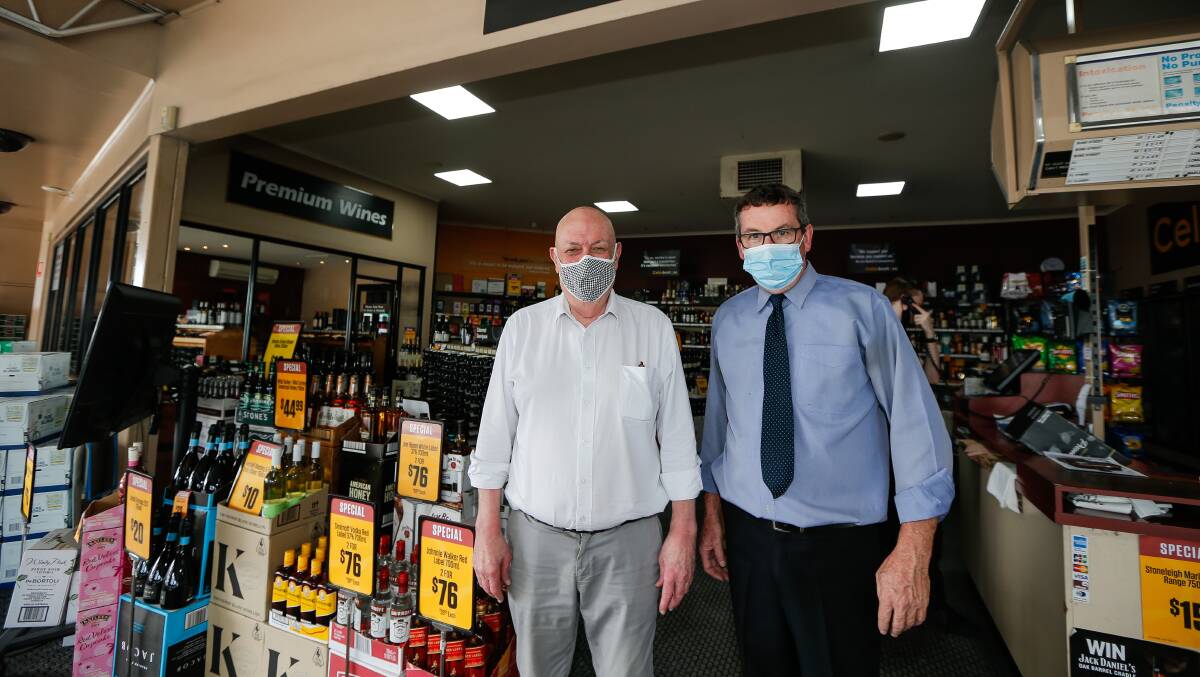 BOOST: Mac's Hotel owner Peter 'Cork' Walsh and staff member Brendan Conheady said alcohol sales balanced business amid the coronavirus pandemic. Picture: Anthony Brady