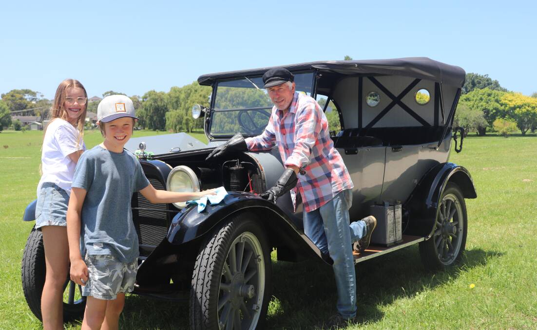 ON SHOW: Murray Murfett is gearing up to show his 1920 Dodge Brothers tourer with his grandchildren Poppy, 13, and Felix, 11, McDonald. Picture: Kimberley Price