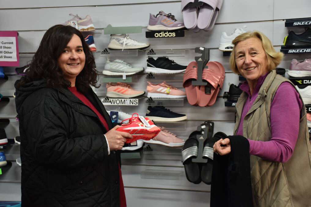 SOLUTION: Casterton Sports and Alls Vikki OBrien hopes the Return to Business scheme will help her business continue to find ways to offer premium products to customers such as Kaye Mitchell. Picture: Supplied.