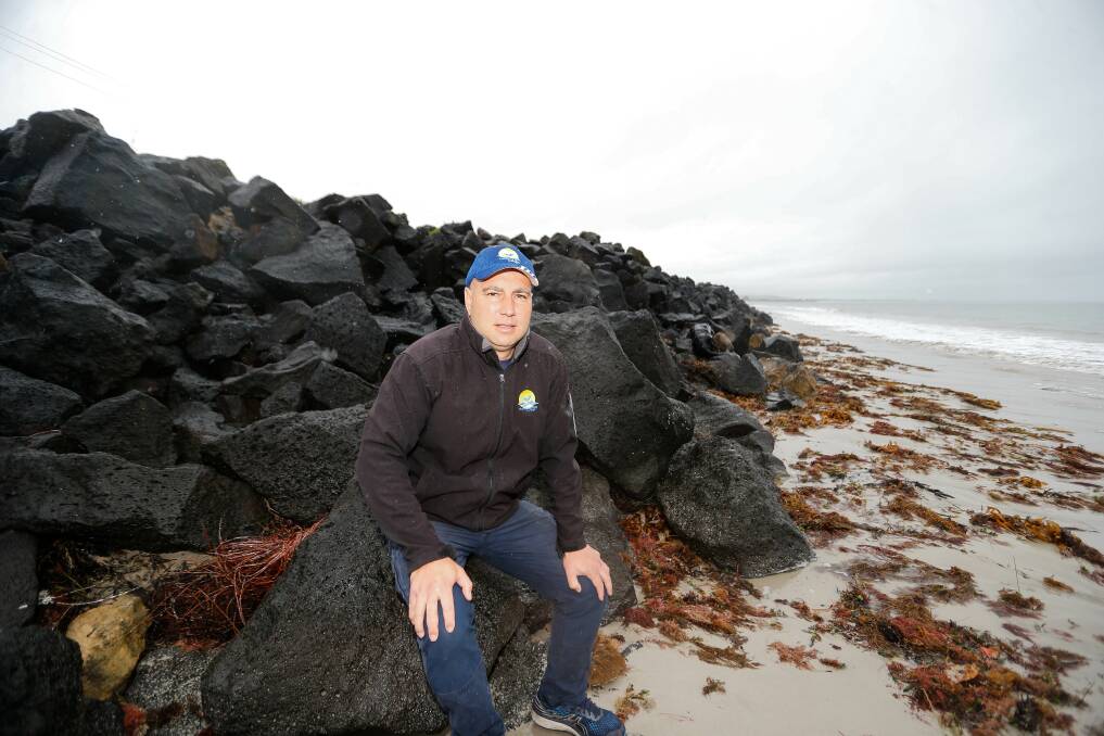 CONCERNED: Portland Beach Safety and Restoration Alliance executive officer Dean Beckman is urging the state government to take action on a dangeorus rock wall originally constructed in the the 1950s. Picture: Anthony Brady