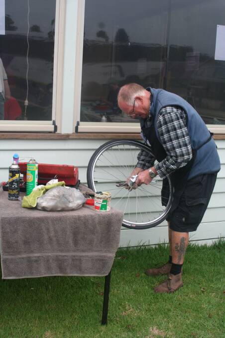 FIX IT: Bruce Anders at work during July's Repair Cafe at the Port Fairy Community House. The event is back returns this Saturday. 