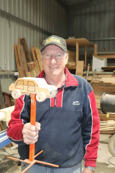 WOODWORK: Warrnambool Triton Woodworkers president Len Byron with an example of what the kits can make. Picture: Kimberley Price