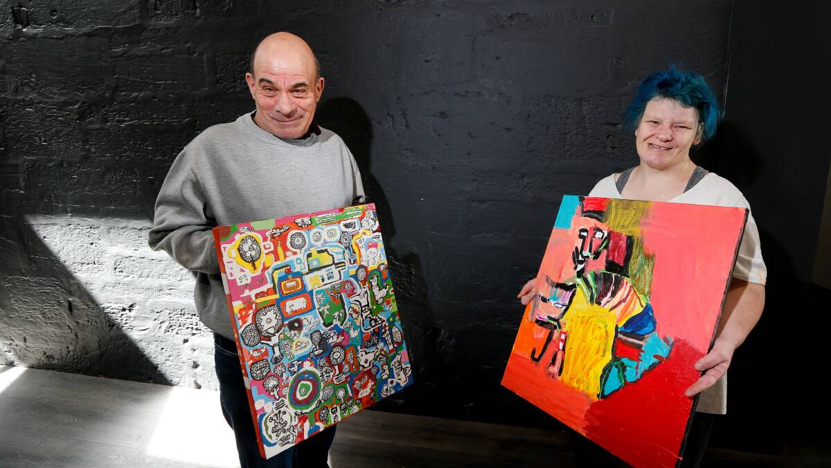 ARTISTS: Ricky Taylor and Ebony Stevens are taking part in a community art exhibition at Realise Enterprises Art Gallery, located at Tasty Plate in Warrnambool. Picture: Anthony Brady