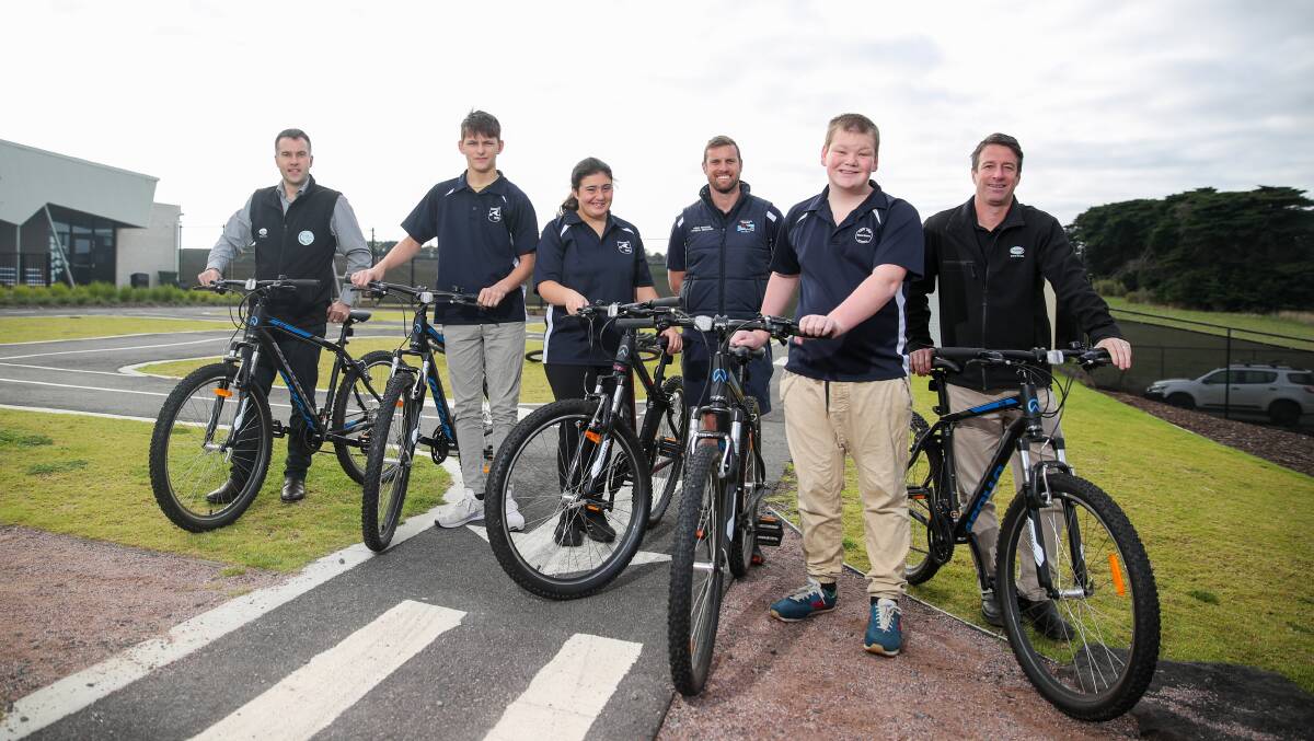 Andrew Nevill, Andrew Parsons, Sarah Kavanagh, Aidan Nicolson, Felix Leslie-Inman and Nick Hayes with the new bikes. Picture: Morgan Hancock.