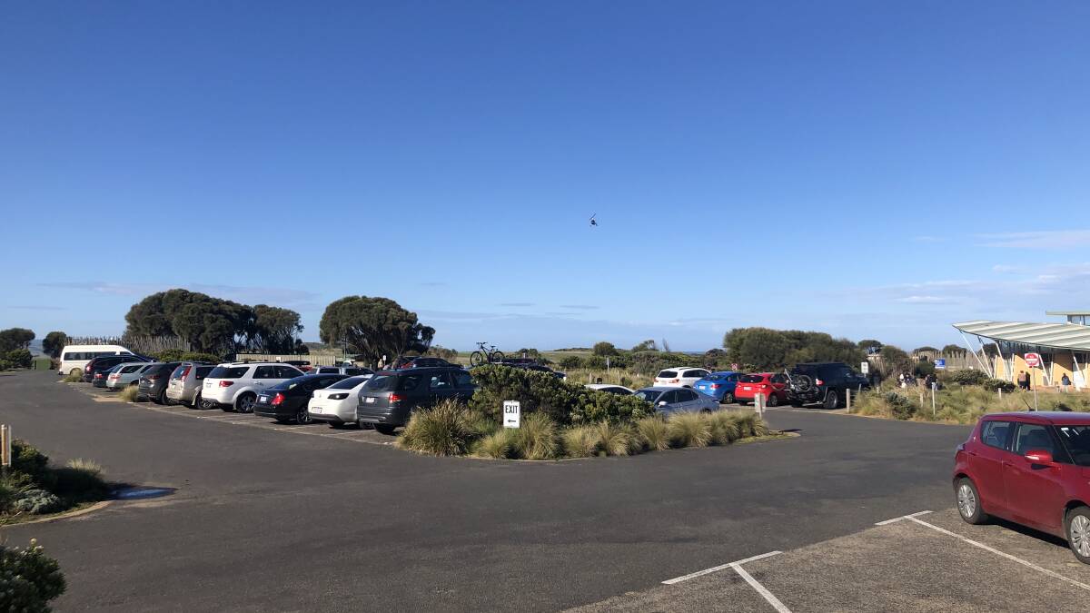 The Twelve Apostles car park was almost full on its first weekend open after coronavirus restrictions forced its closure in March. Picture: Kimberley Price
