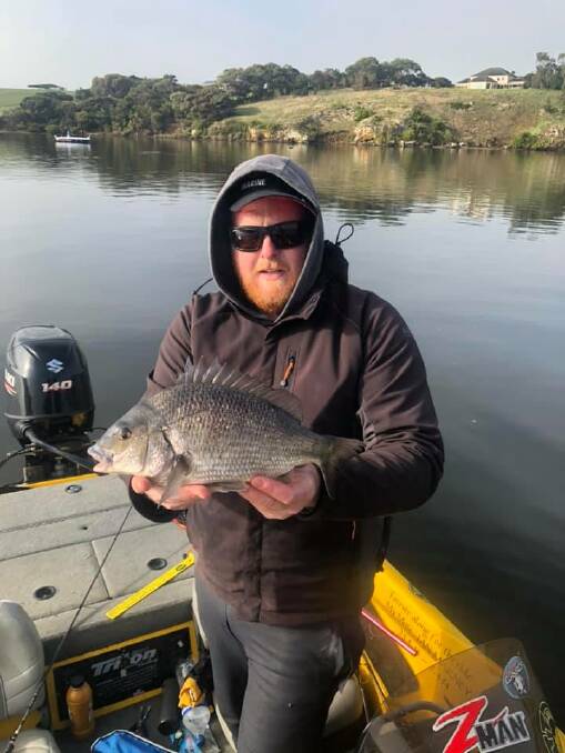 NOT EASY: Adam Brown with a healthy bream from the weekend's Vic Bream Classic round ... to say things were tough is an understatement. You can send your pictures in to fishing@richardsonmarine.com.au