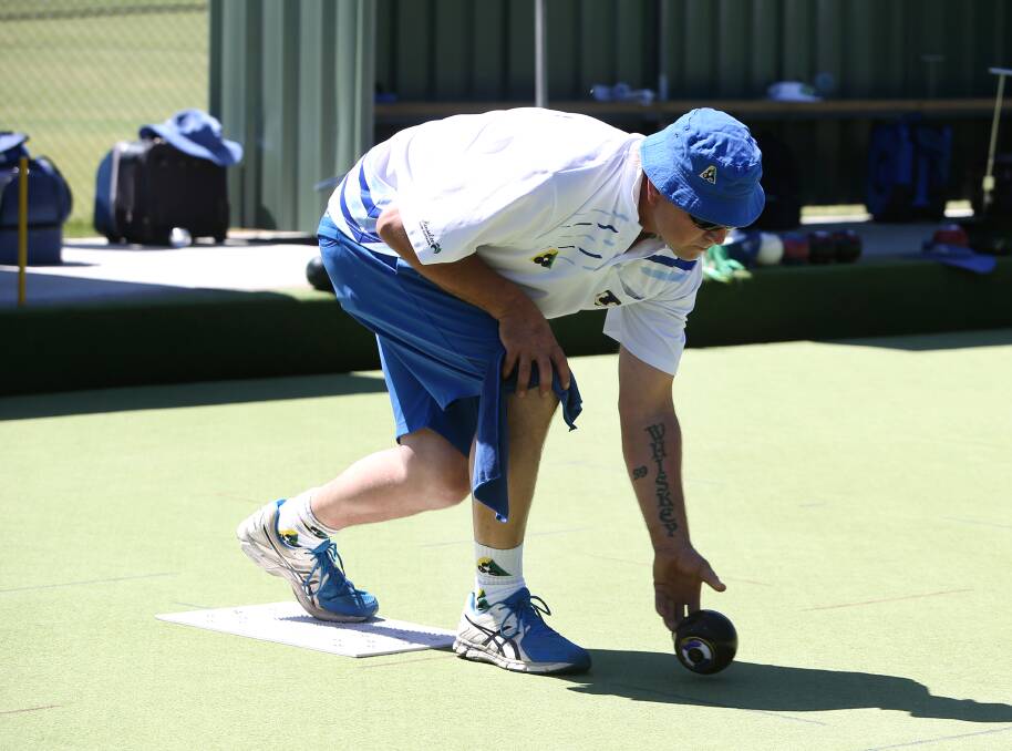 IN ACTION: Mortlake Blue Division 1 player David McNicol sends his bowl down. The club, founded in 1922, has 40 male and 25 female bowlers. Picture: Amy Paton