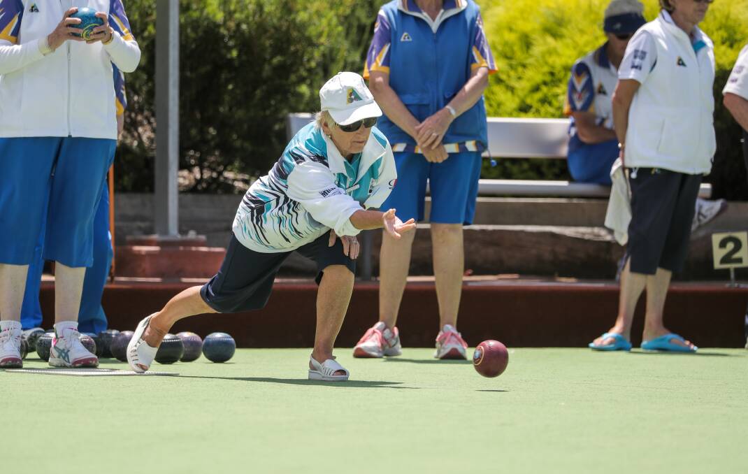 CLUB CHAMPION: First-time Port Fairy champion Patti Murray stretches to release her bowl. Picture: Rob Gunstone