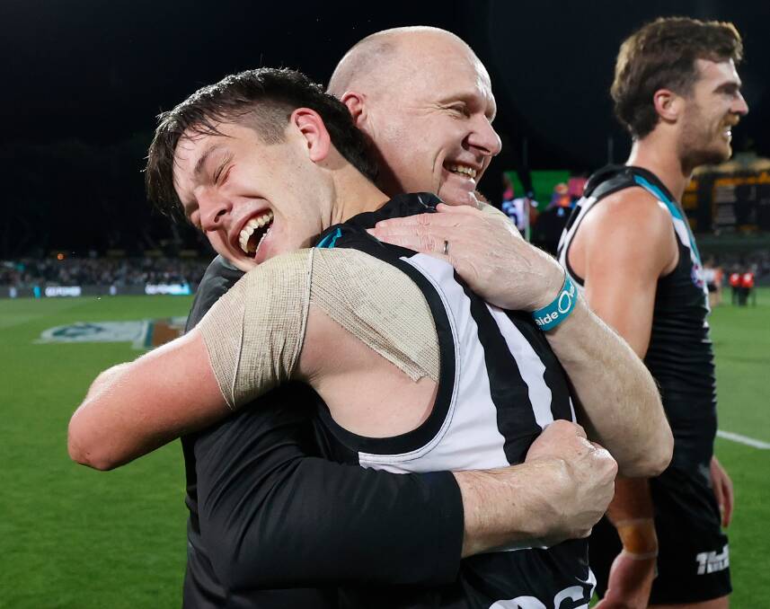 POWERFUL: Port Adelaide Football Club coach Ken Hinkley, who is from Camperdown, embraces player Zak Butters after the Power beat Geelong in the qualifying final. Picture: Getty Images