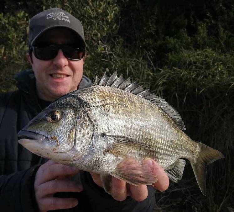 SUPER: Matthew Walkeden with a healthy bream from the mouth of the Hopkins River.