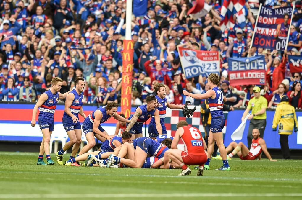 MOMENTOUS: Frank Corona was there when the Western Bulldogs' scored their drought-breaking premiership win in 2016. Picture: Justin McManus
