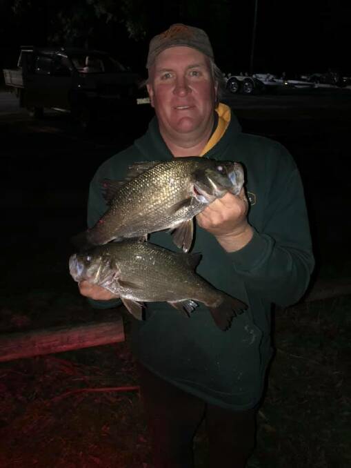 SENSATIONAL: Harry Linke with a couple of nice Estuary Perch from the Glenelg River.