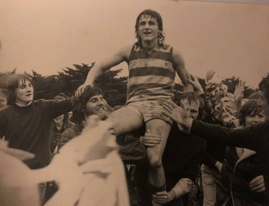 TOP OF THE WORLD: Leon Harris is chaired from the ground. After his winning ways with Mortlake, Harris went on to play 200 games for Fitzroy.