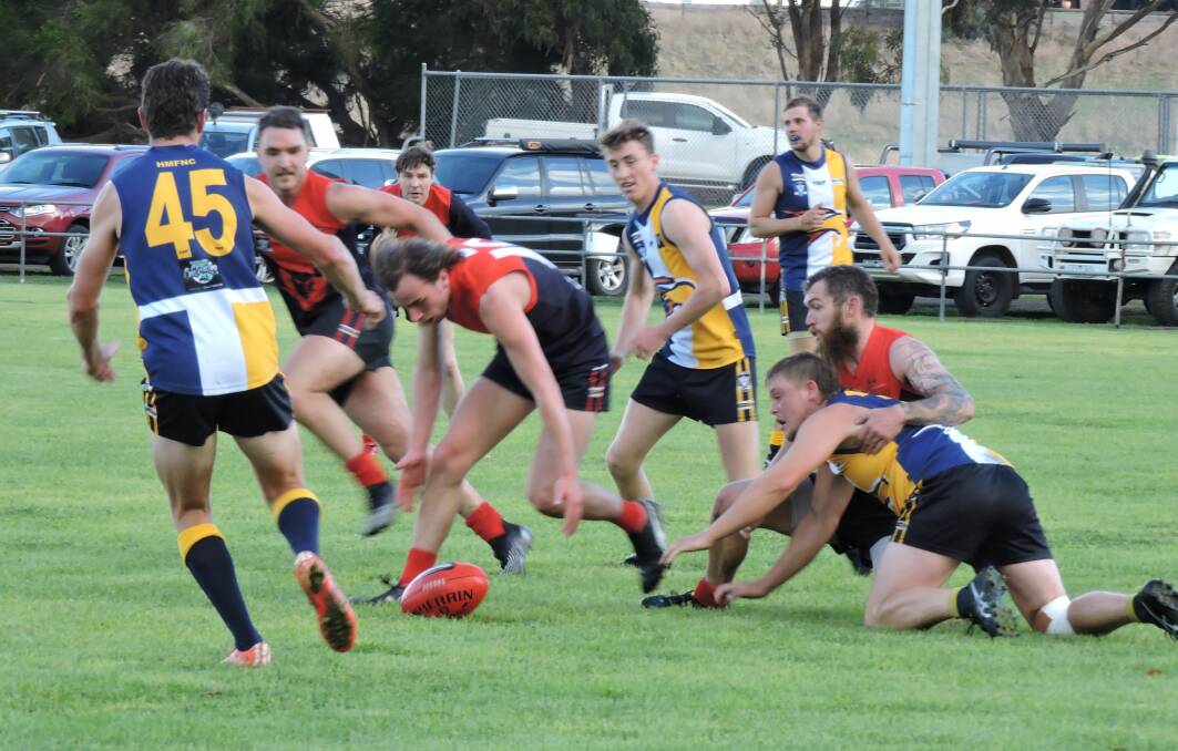 HARD AT IT: Possession was hotly contested during Saturday's match between Hawkesdale Macarthur and Lismore Derrinallum. Picture: Supplied