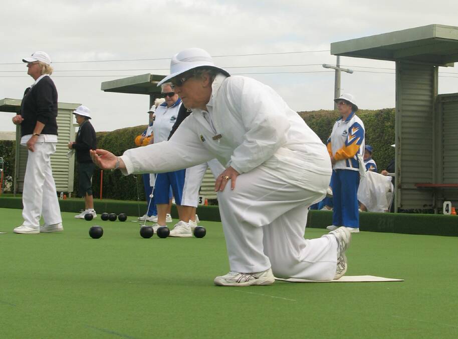 ROLLING: Liz Lenehan sends her bowl down the green while playing for Koroit Bowls Club in February 2011. Picture: Anthony Brady