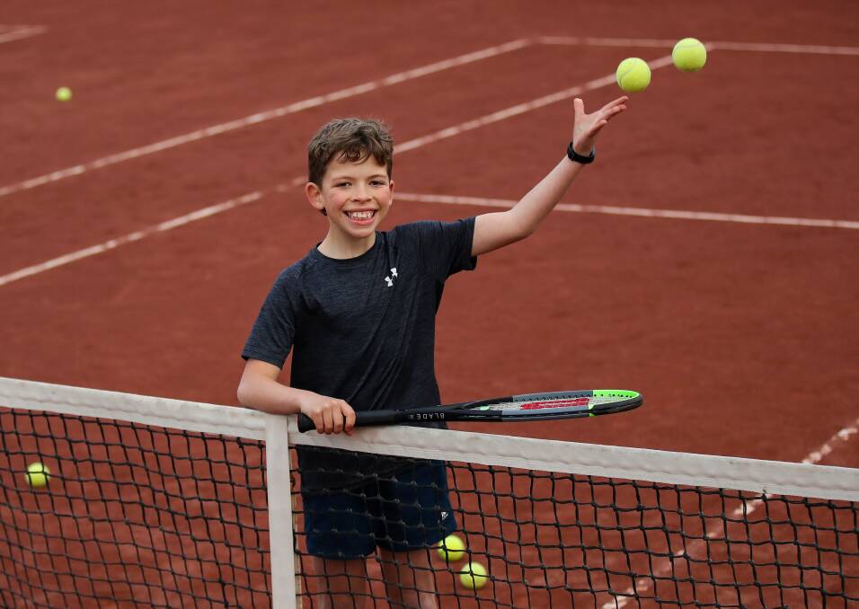 BACK IN SWING: Beachside Tennis Academy player Fletcher Monaghan, 11, at his tennis lesson on Friday in Warrnambool. Picture: Morgan Hancock