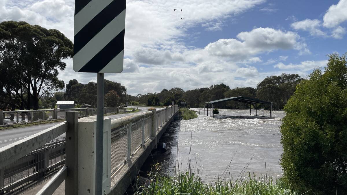 The bridge at Panmure was being closed on Sunday as rising flood water burst the banks of Mount Emu Creek.