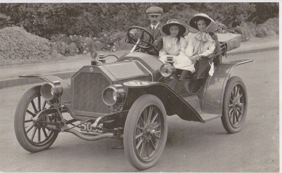 An historical postcard from 1912 of Murray Murfett's car featuring the original owner Andrew Lyell and his two daughters.