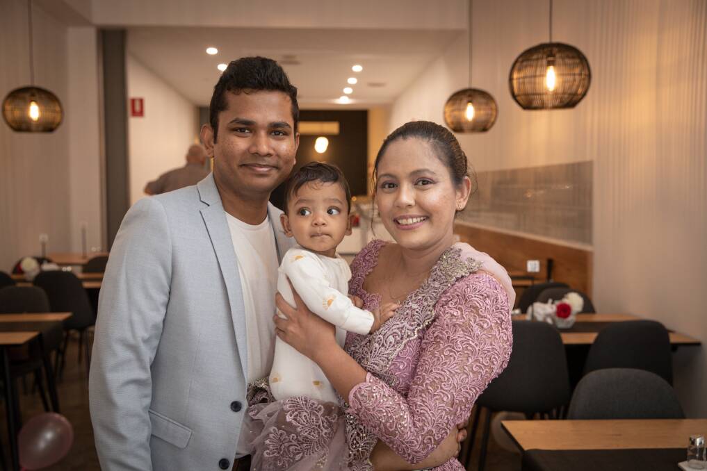 Ravindu and Nishika Kariyawasam with baby Kaden, six months, have opened a new cafe/restaurant in Liebig Street. Picture by Sean McKenna.