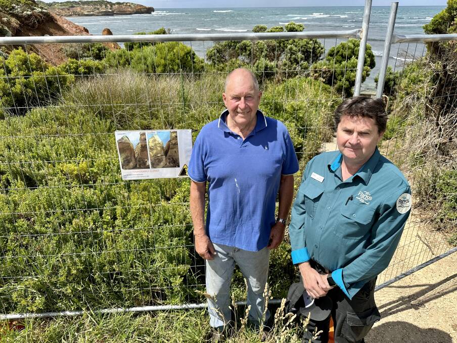 Peterborough Residents Association president Ronald Irvine and Parks Victoria acting manager Andrew McKinnon want people to stay away from a dangerous section of beach until the rock column in danger of collapse is removed.