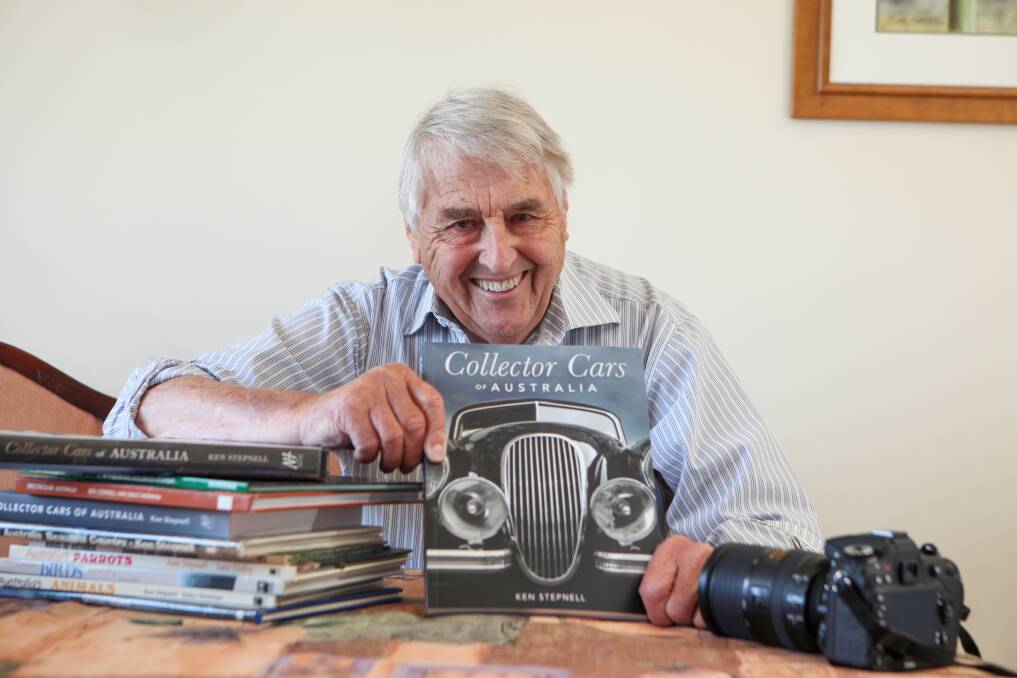 Page turner: Warrnambool's Ken Stepnell has added 70 new photos to the third edition of his book Collector Cars of Australia. Picture: Rob Gunstone 