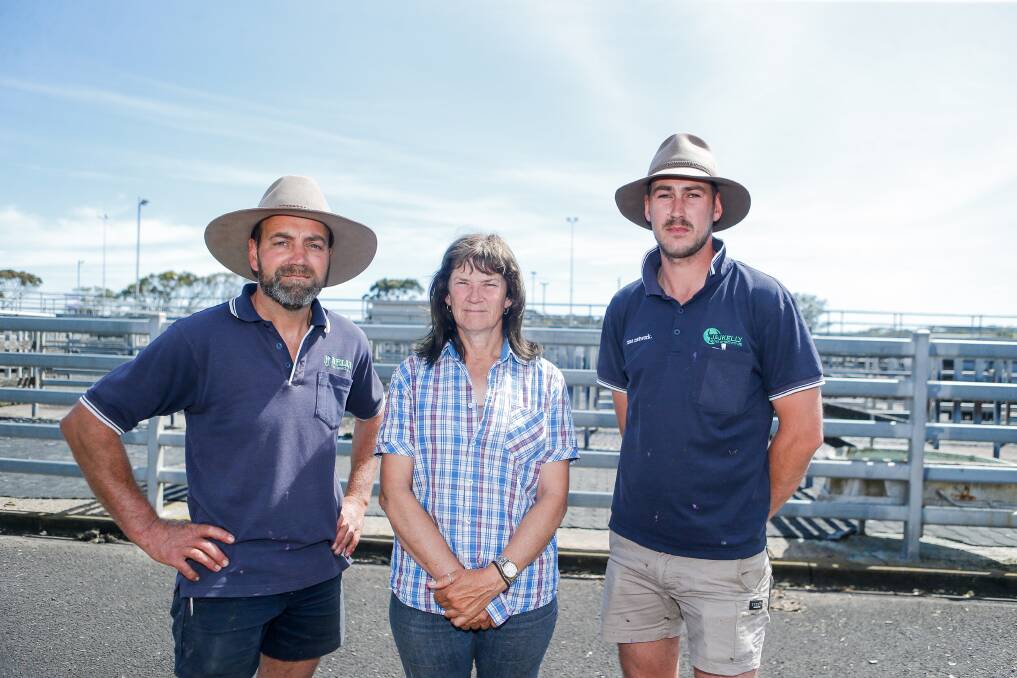 Cattle seller Janet Williams - pictured with stock agents Matt Dews and Tyler Duynhoven - says the closure of the saleyards will have a big impact on mental health. Picture by Anthony Brady