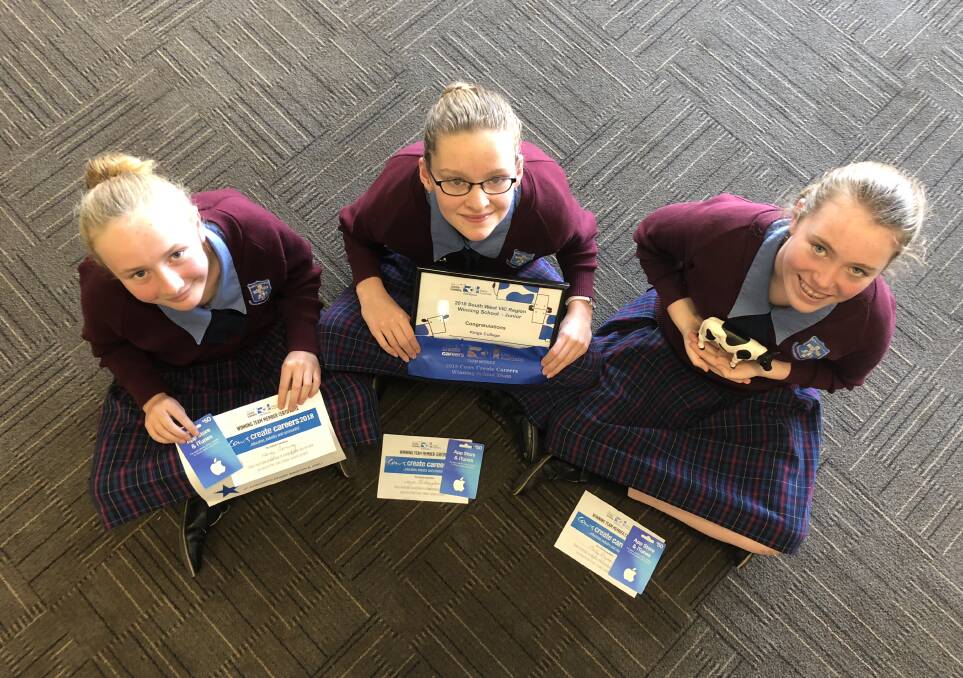 Kings of the cows: Heidy Fleming, 12, Jorja McNaughton, 13, and Molly Rhyne, 12, were joint first-prize winners of the Cows Create Careers program.  