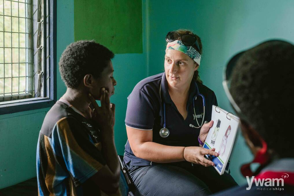 Rachel Bakker puts her skills to use in PNG teaching women about pregnancy.