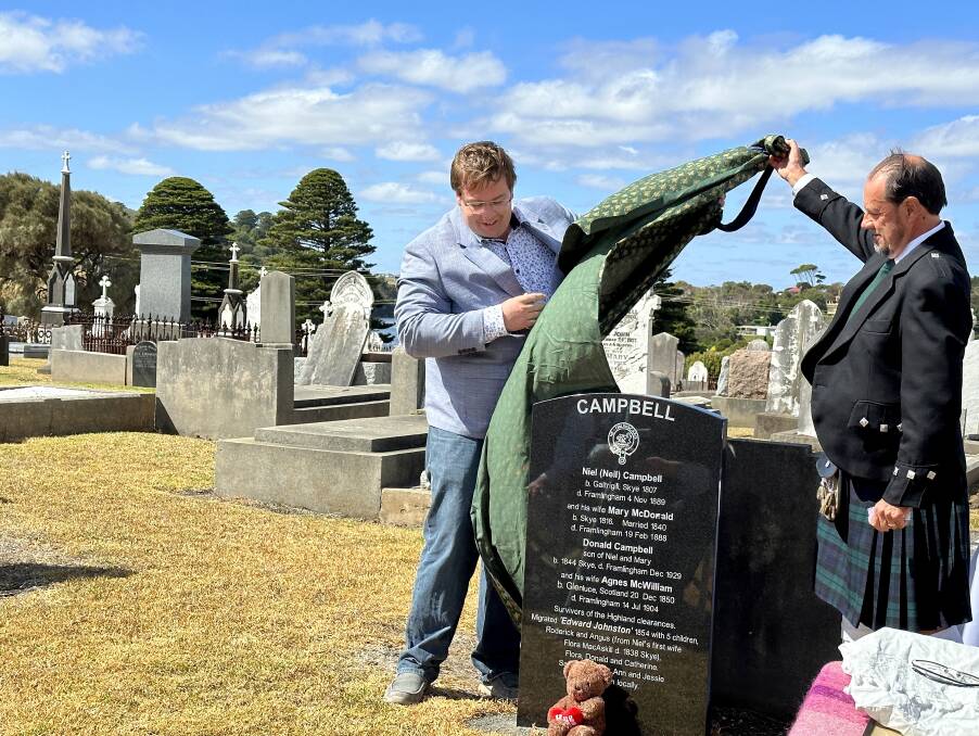 Warrnambool mayor Ben Blain unveils the new headstone at the Warrnambool cemetery. Picture by Katrina Lovell