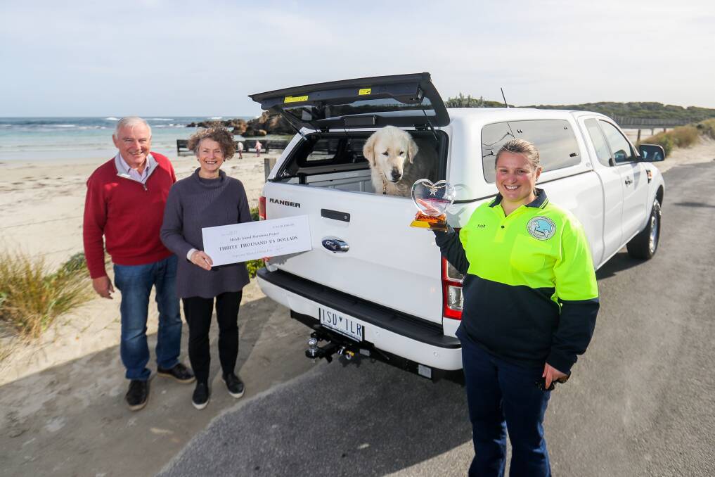 Generous: Anne and Rob Wallis with penguin protector Amor and Trish Corbett after they took delivery of the new car to transport the maremmas to Middle Island. Picture: Morgan Hancock