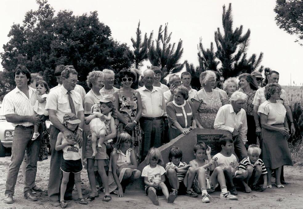 Familes gather for a plaque unveiling at Glengleeson East in 1989.
