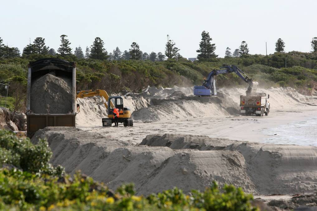 Sand being put onto the beach when the bay was last dredged back in 2009. This time sand will be put "near shore" closer to the surf club.