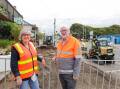 Mayor Debbie Arnott and acting CEO David Leahy on Banyan Street where footpath works are under way. Picture by Anthony Brady