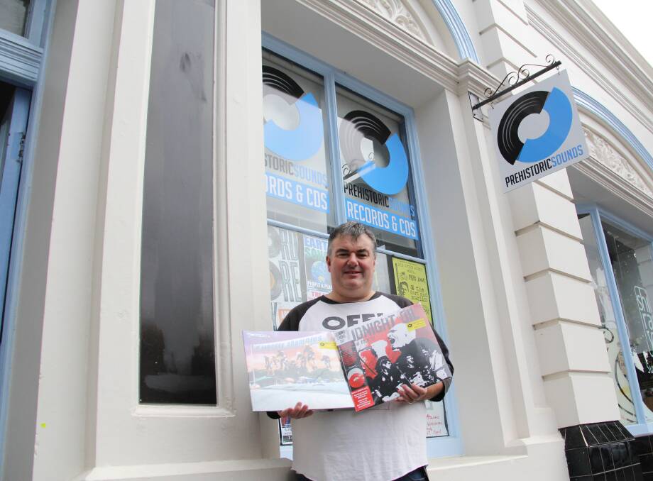 Doors open: To celebrate world record store day, Prehistoric Sounds owner Shane Godfrey has moved to a new store in Kepler Street. 