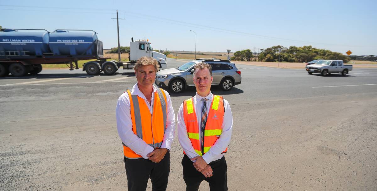 New pursuits: The council's infrastructure director Scott Cavanagh (right) has resigned after four years in the job. Here he is pictured with mayor Tony Herbert campaigning for highway upgrades.