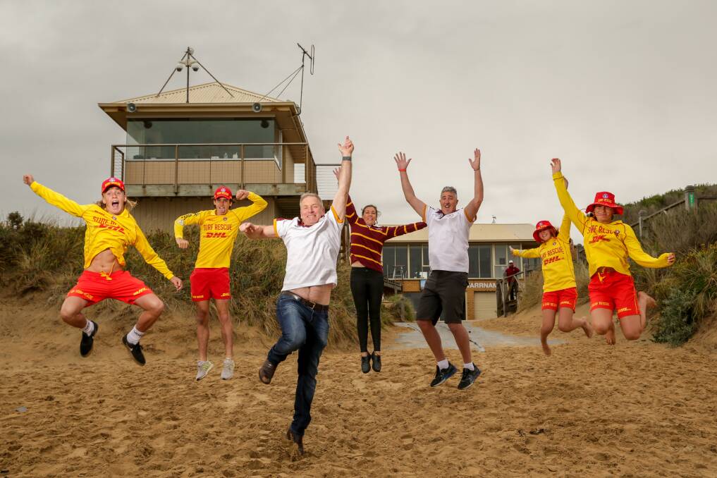Bring it on: Surf club members celebrate the Coalition's funding commitment.