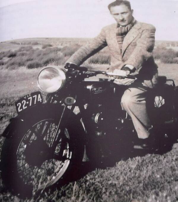 Les O'Callaghan on the motorbike that was taken off him to help the war effort during World War II.
