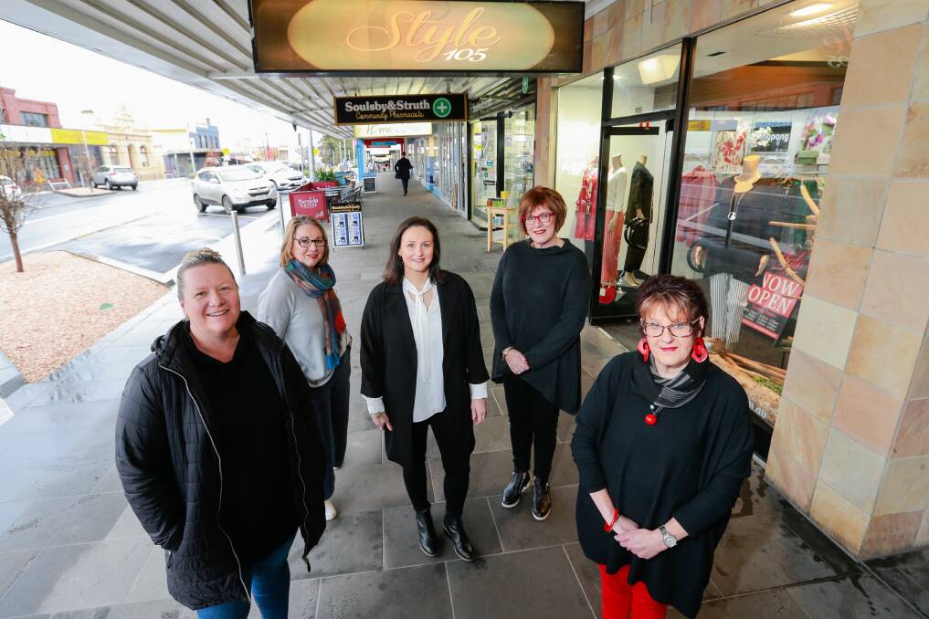 Time to shop: Bendigo Bank's Adele Griffin, pictured last year with some Warrnambool traders, has launched a new campaign to encouraged people to shop locally to help businesses to recover from the pandemic. 