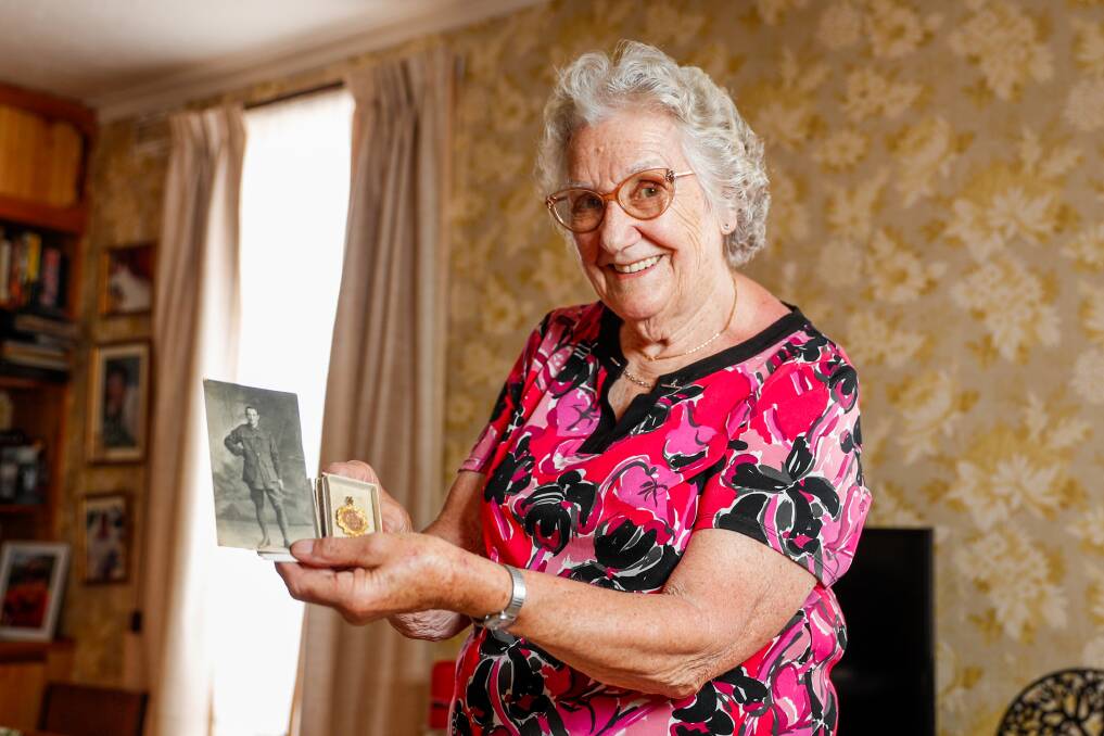 Not forgotten: Marianne Tinker with a photo of her husband's uncle Les Tinker who was awarded a medal for rescuing passengers from the Hopkins River after the sinking of The Nestor. Picture: Morgan Hancock