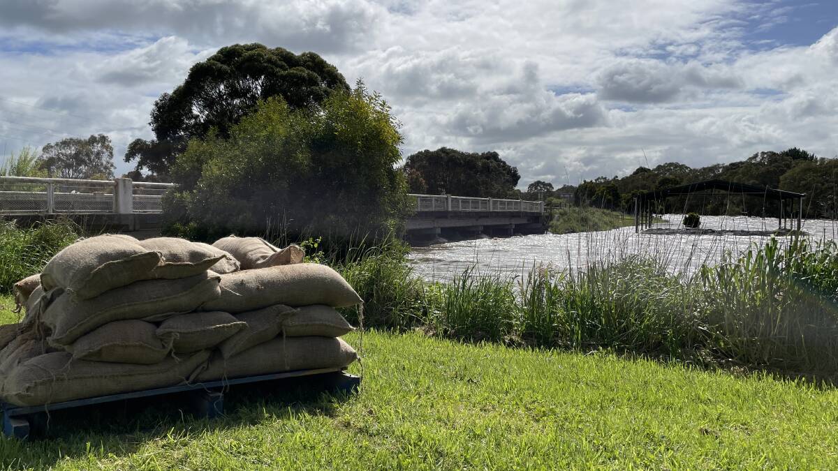 Sandbags ready to go at the flooded Mount Emu Creek at Panmure on Sunday morning about 10.30am.