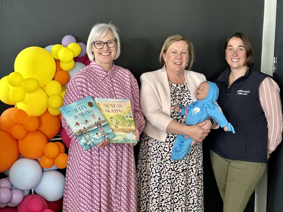 Author Andrea Rowe, TAFE's executive manager for education Louise Cameron and North Edge childcare centre's Nicole Collins at the launch of a new training program to help fill the gap in child care staff. Picture by Katrina Lovell