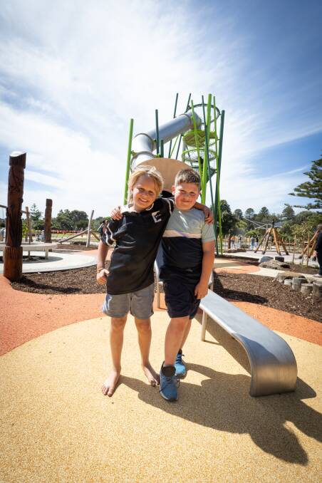 Charlie Walsh, 8, and Tyler Monagle, 7, after trying out the new slide. Picture by Sean McKenna. 