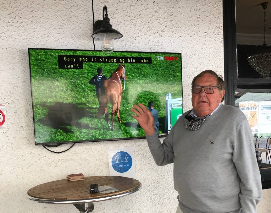 Celebrations: Peter Balderstone, a part owner of a horse that won $6.7 million on Saturday in Sydney, was so excited he shouted everyone at the pub where he watched the race. Picture: Terri Barnes 